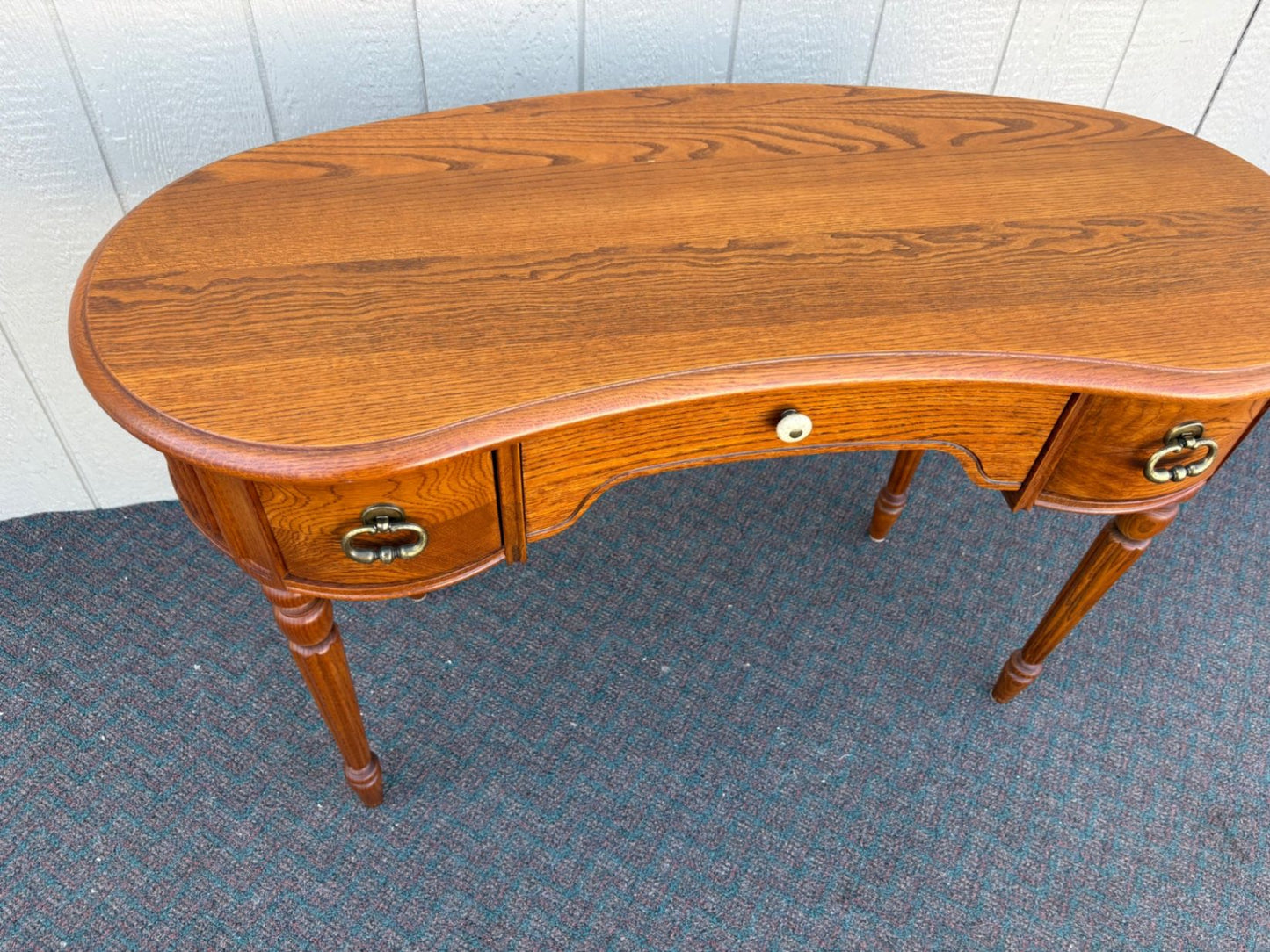 67435 Lexington Oak Kidney Desk with Brass Hardware