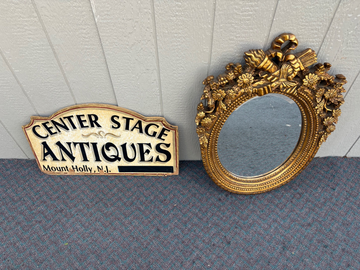 Ornate Gilt Gold Oval Mirror with Floral and Ribbon Details