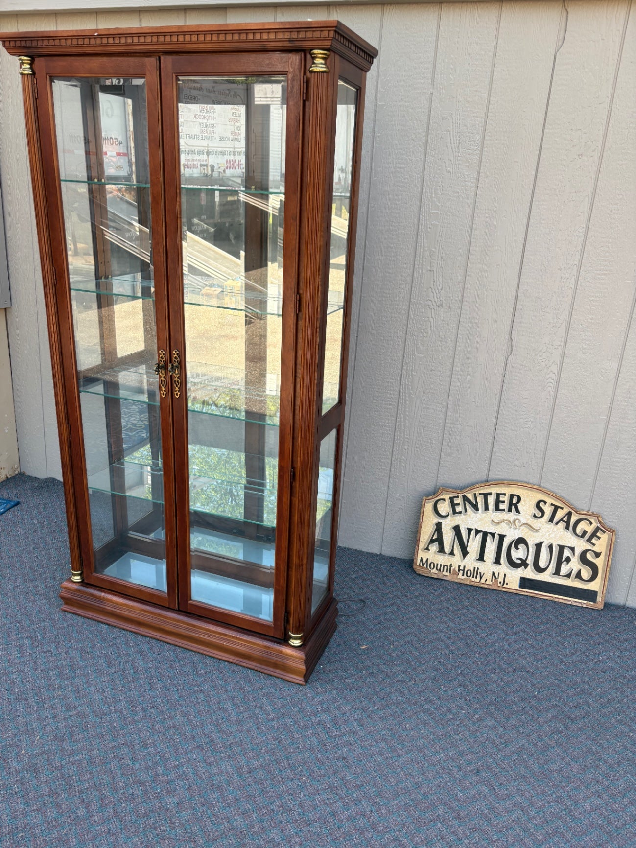 67753 Pulaski Traditional Glass Front Curio Cabinet with Brass Accents