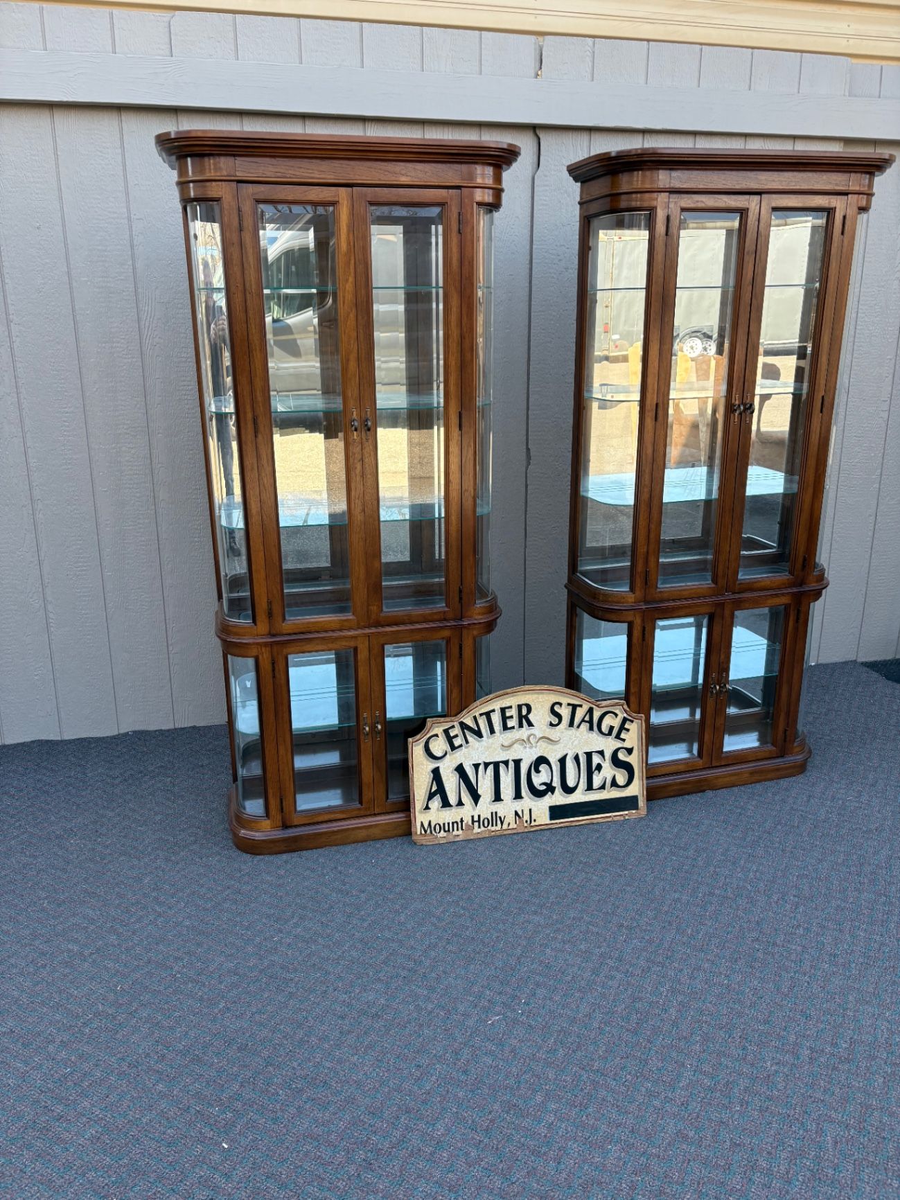 67589  Pulaski Lighted Curio Cabinet with Bowed Glass Doors