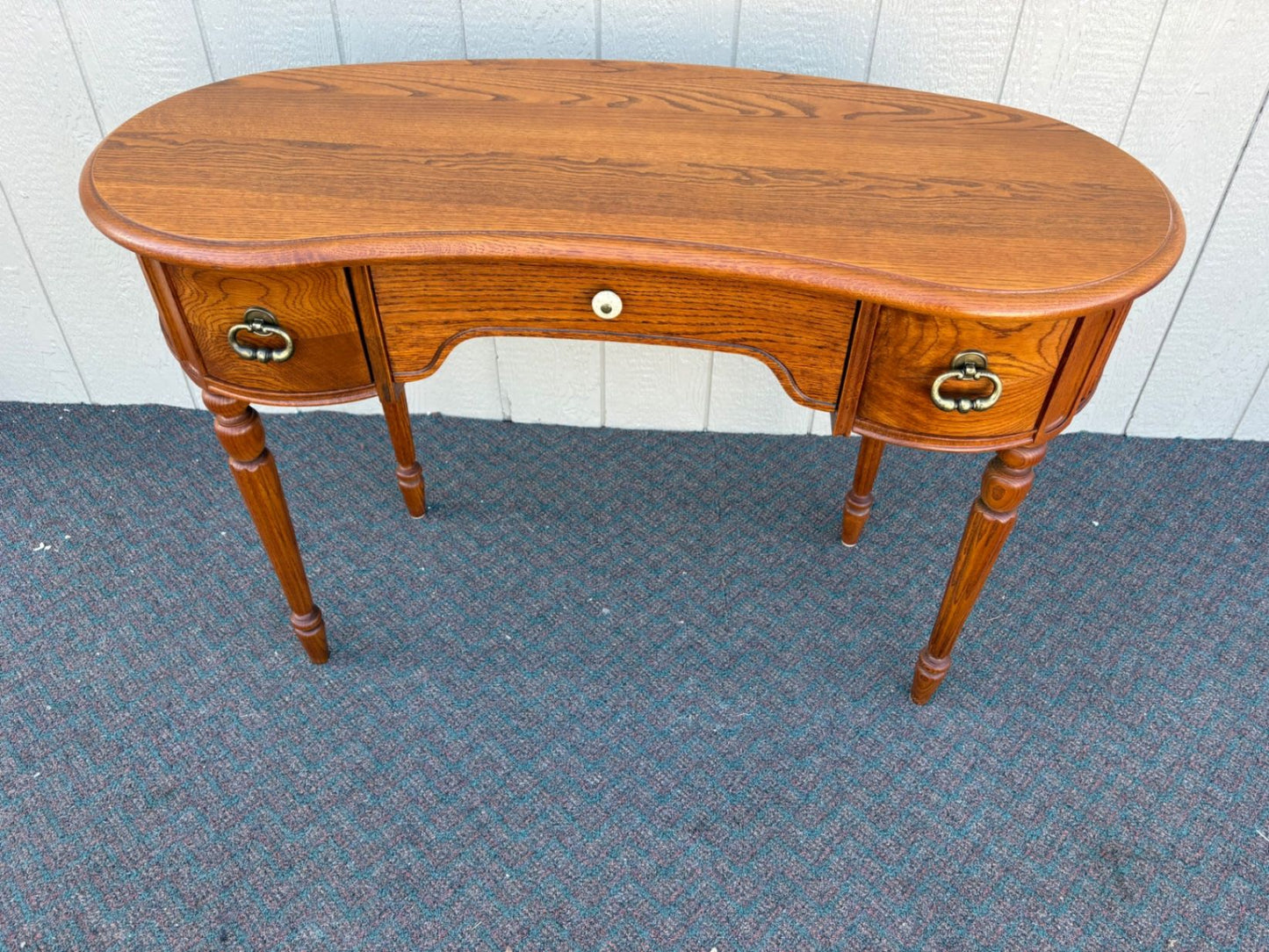 67435 Lexington Oak Kidney Desk with Brass Hardware