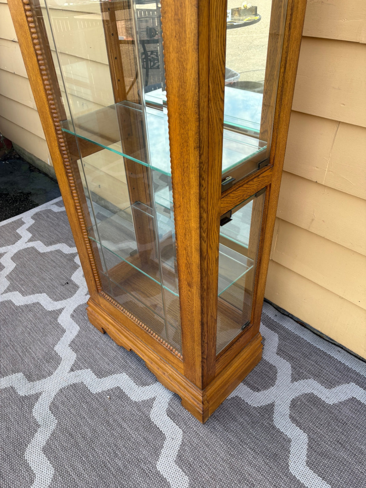 68202  Oak Curio Cabinet with Etched Glass and Crown Molding