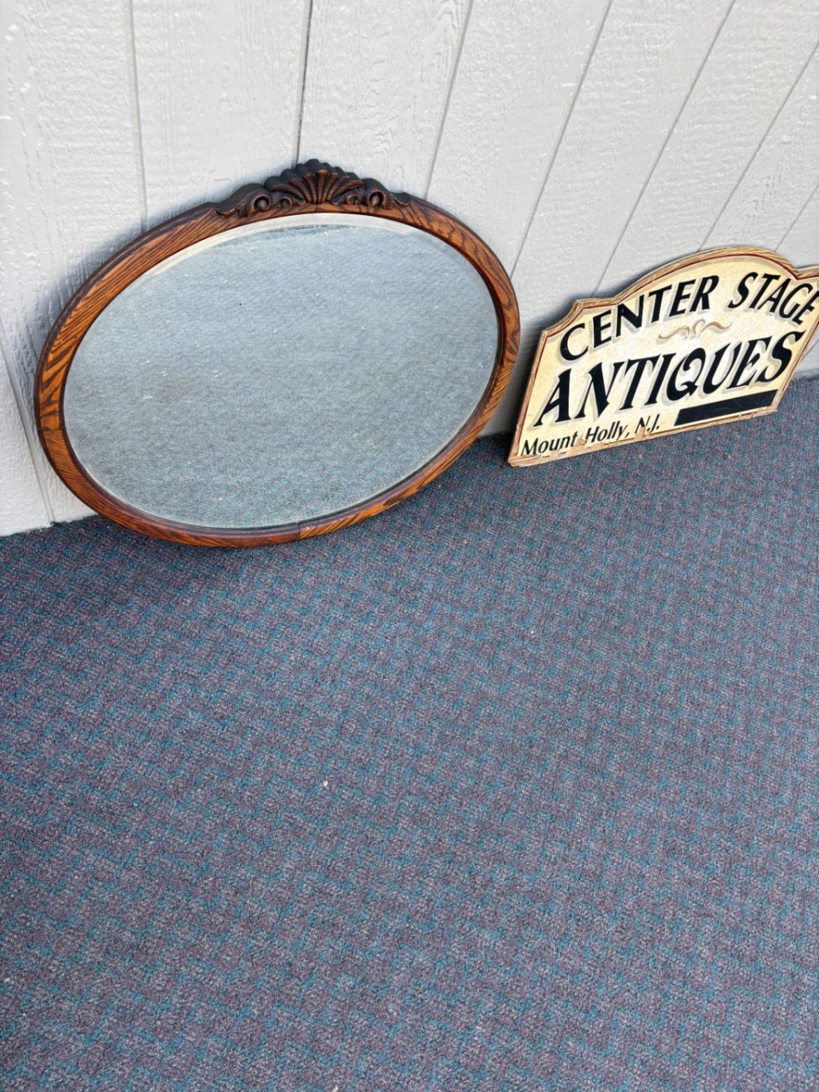 67652 Antique Victorian Oval Oak Beveled Wall Mirror with Carved Detail