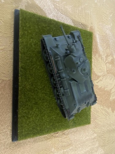 ES 50: Grouping of    4 Miltary  Tanks in Showcase    4 3/4" x 3 3/4" x 2 1/2"H