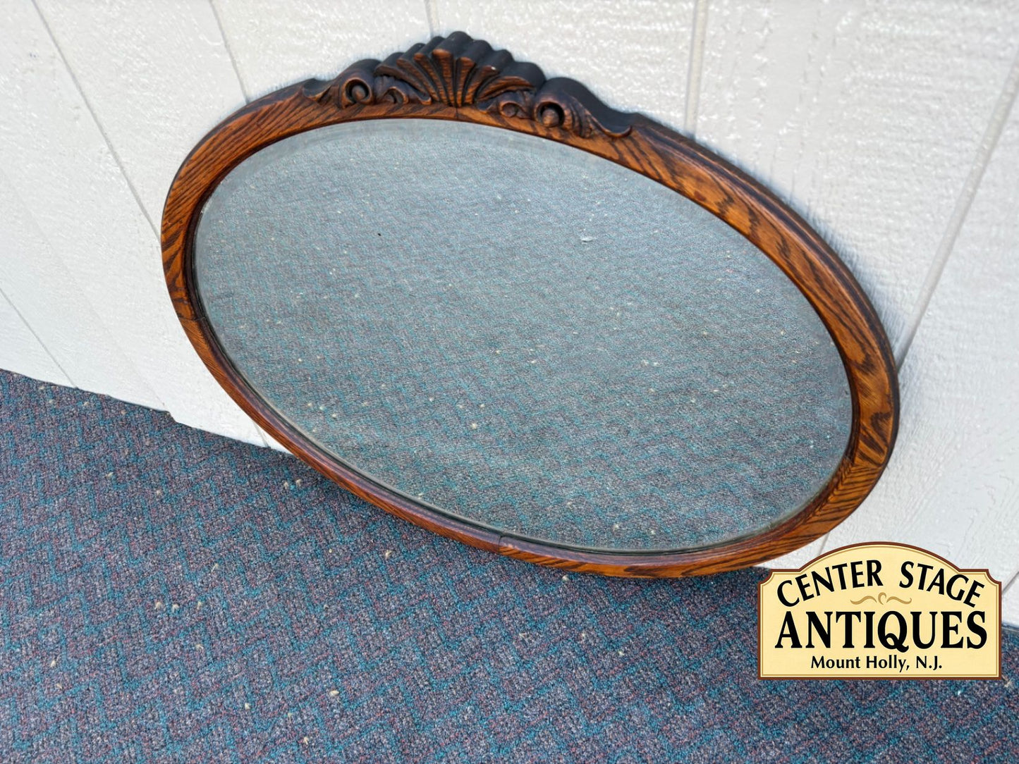67652 Antique Victorian Oval Oak Beveled Wall Mirror with Carved Detail