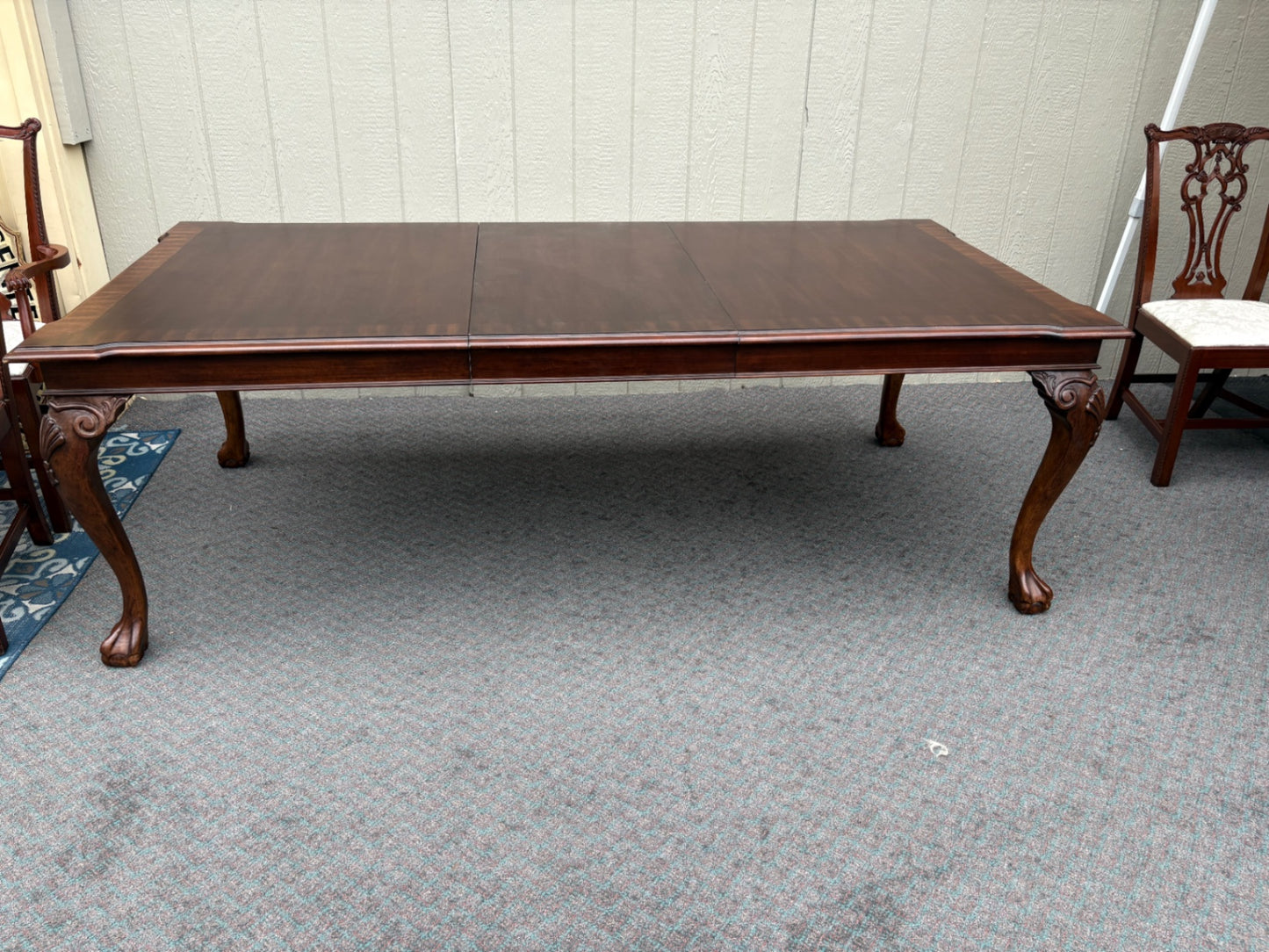 67877  Chippendale Style Dining Table with 8 Carved Chairs in Mahogany