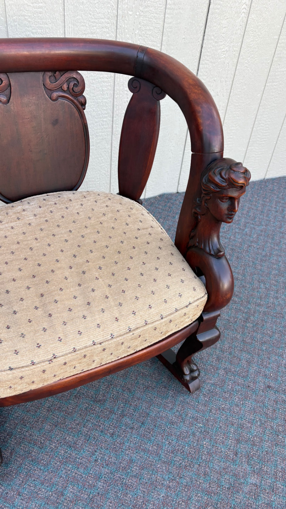 Victorian Mahogany Rocking Chair with Carved Bust Details