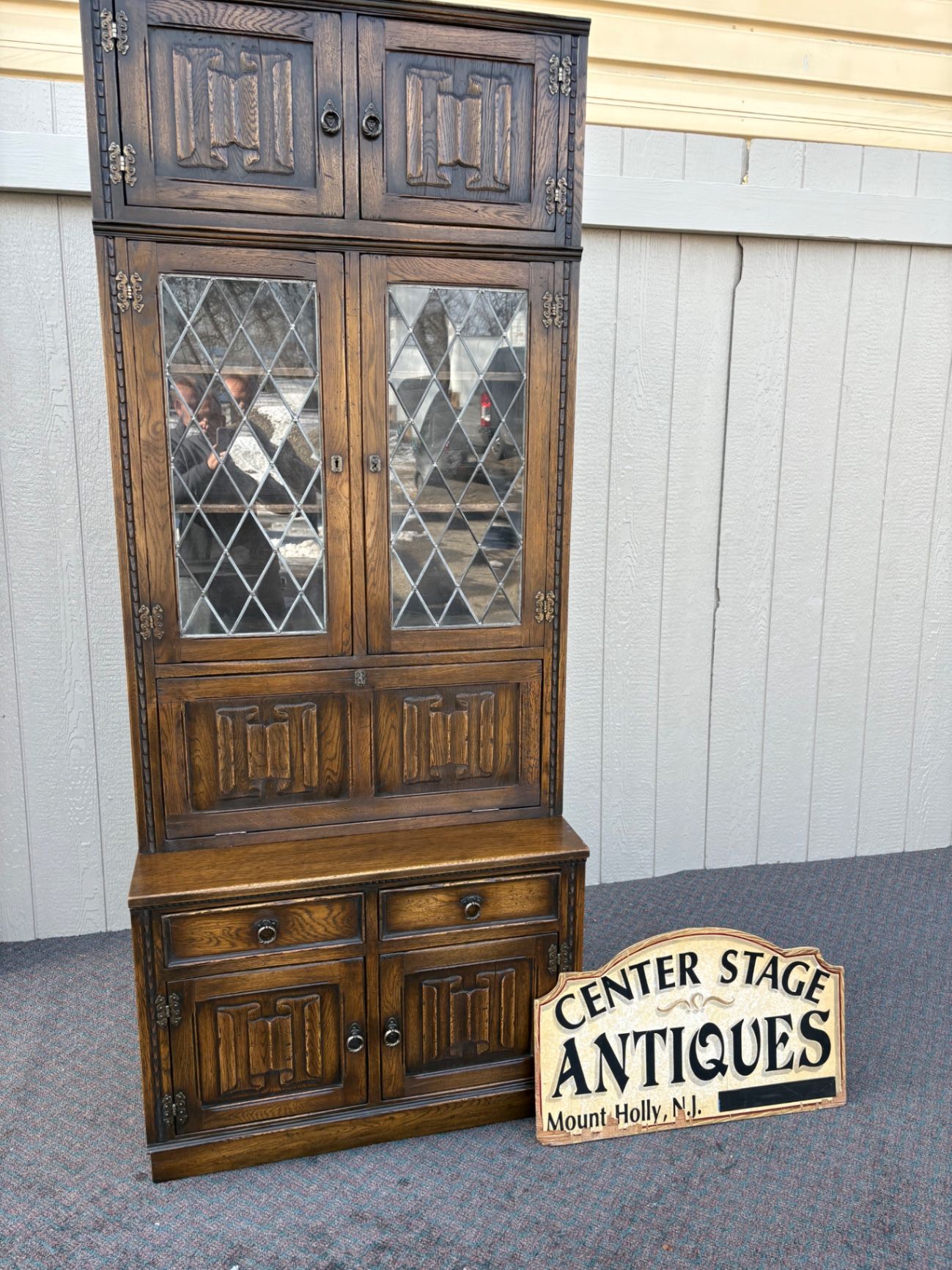 67410  Mid-Century Oak Cabinet with Desk and Leaded Glass Doors