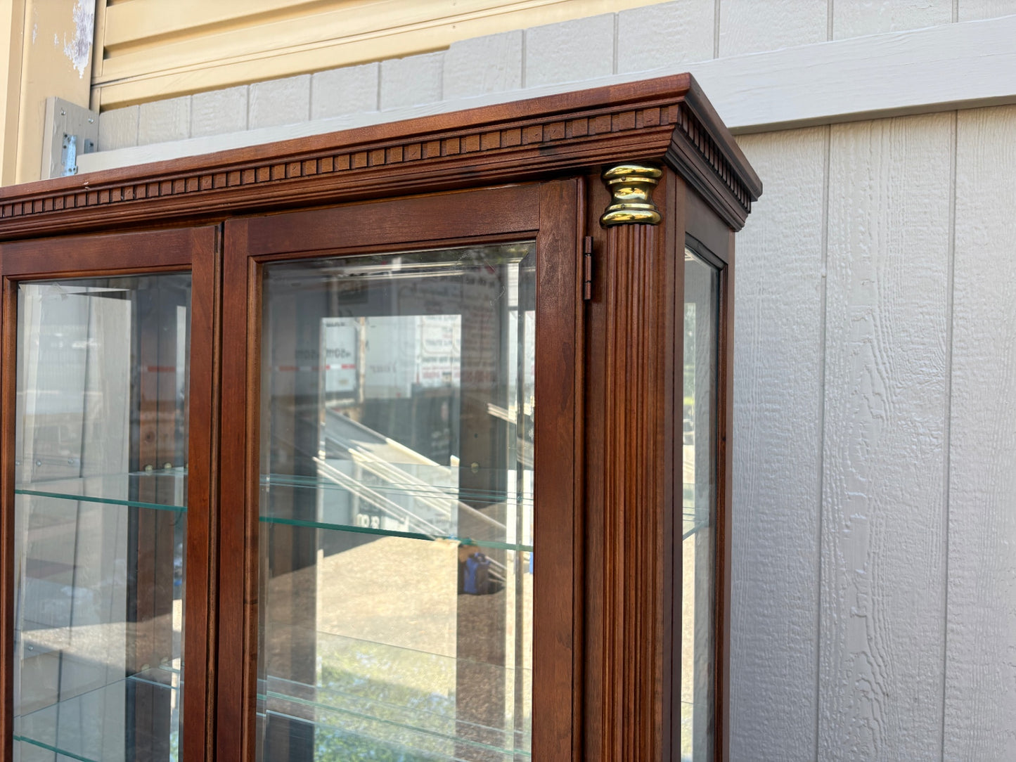 67753 Pulaski Traditional Glass Front Curio Cabinet with Brass Accents