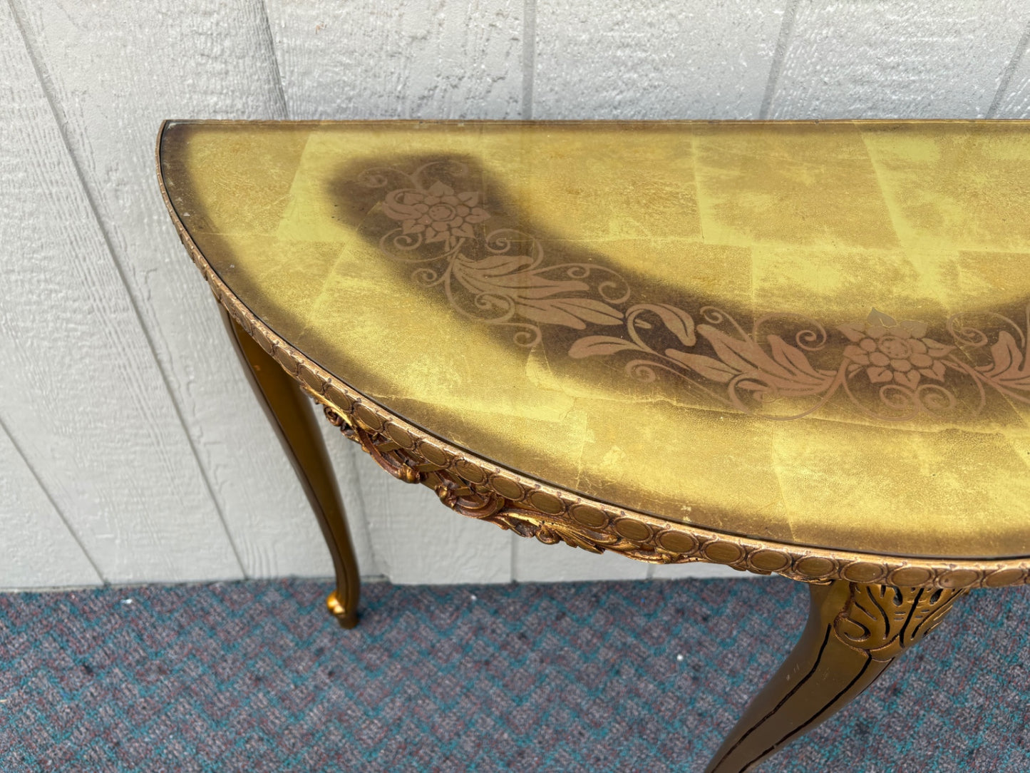 67978 Elegant Gold Demilune Console Table with Intricate Floral Design