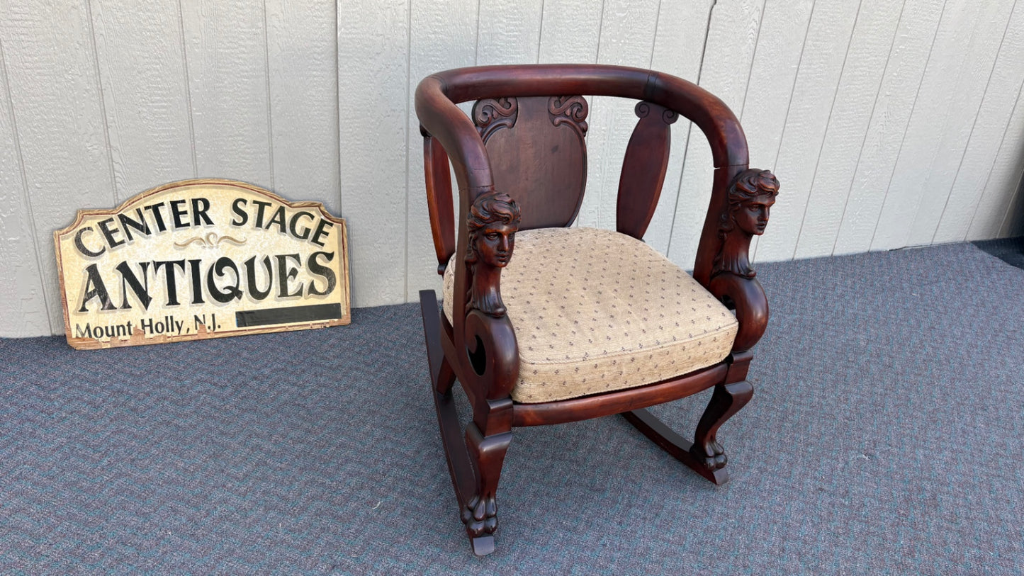 Victorian Mahogany Rocking Chair with Carved Bust Details