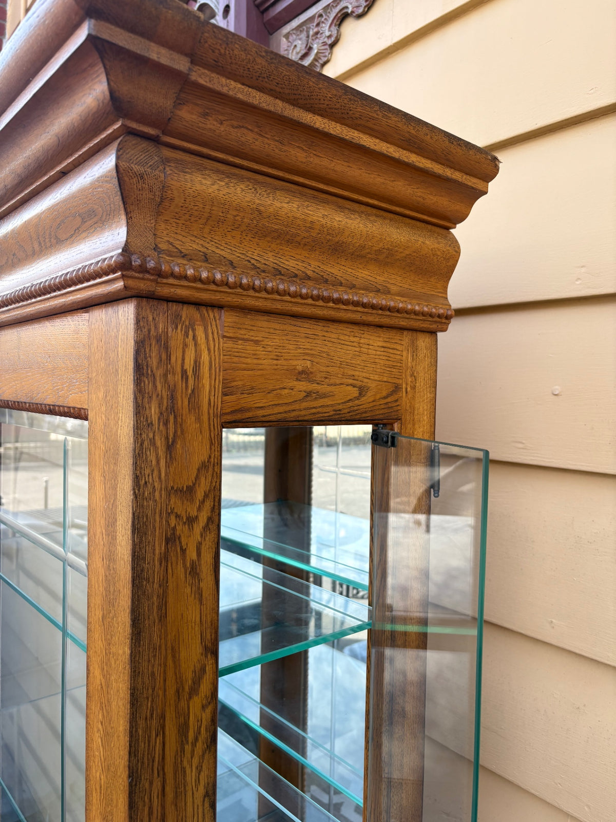 68202  Oak Curio Cabinet with Etched Glass and Crown Molding
