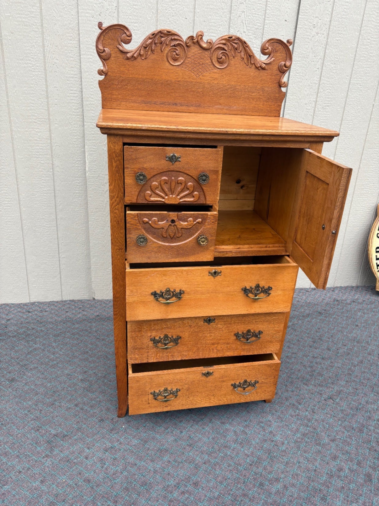 68057  Antique Oak Bonnet Chest with Ornate Carvings and Brass Hardware