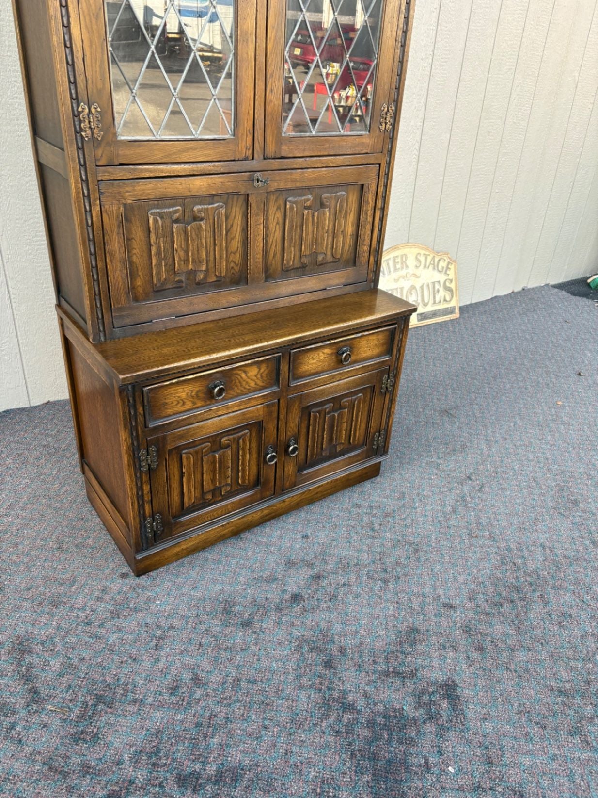67410  Mid-Century Oak Cabinet with Desk and Leaded Glass Doors
