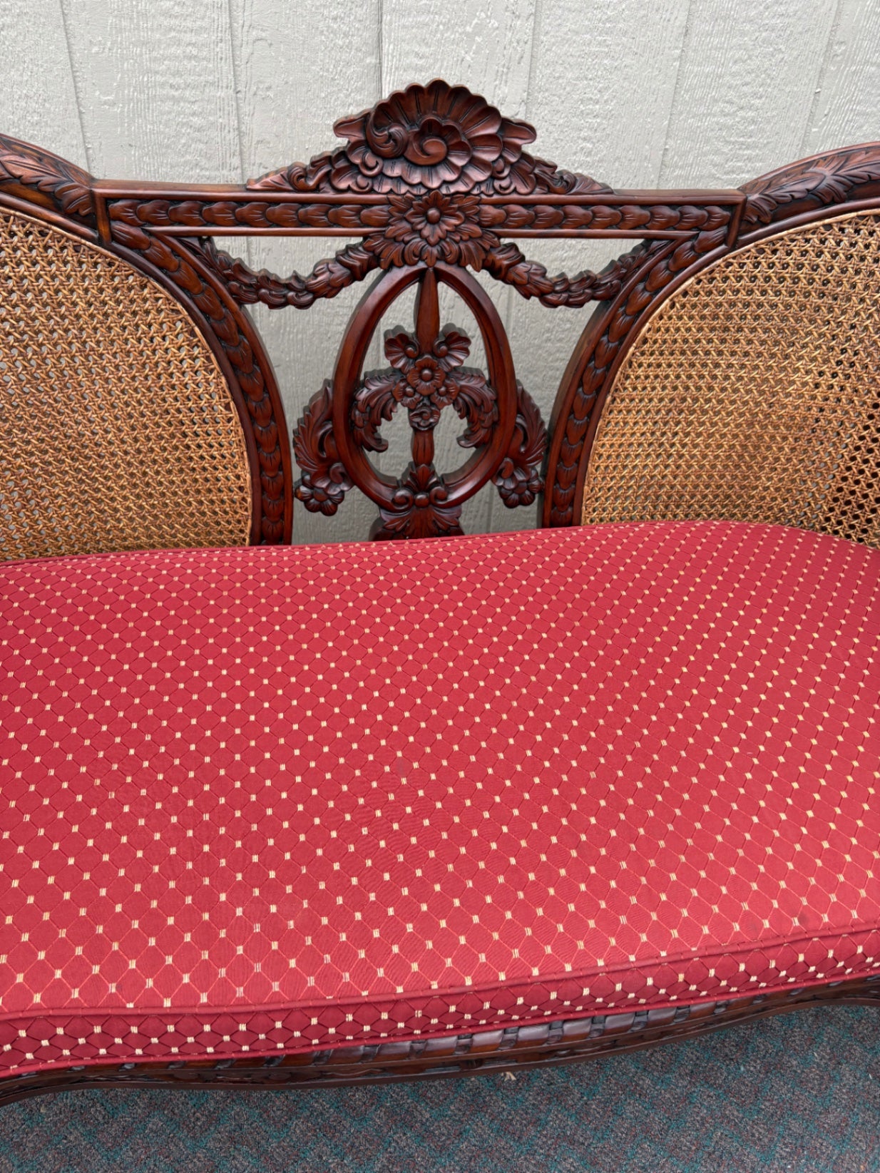 Victorian Carved Wood Settee with Caned Back and Red Cushion