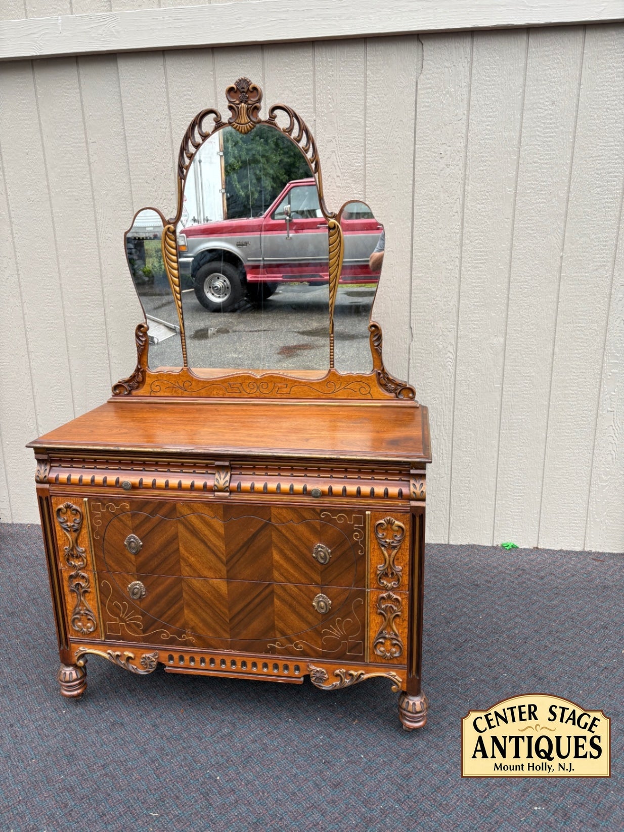 67897  Art Deco Dresser with Ornate Mirror and Intricate Carvings