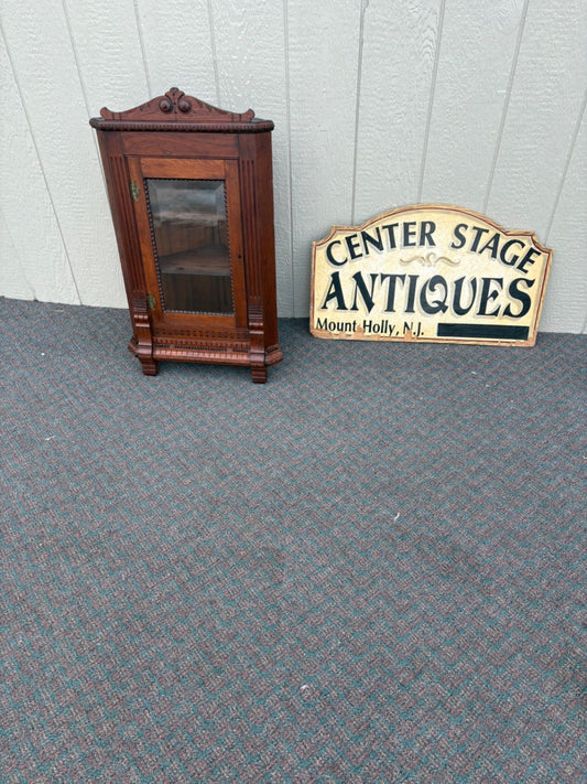67452  Victorian Walnut Corner Cabinet with Glass Door and Carved Details