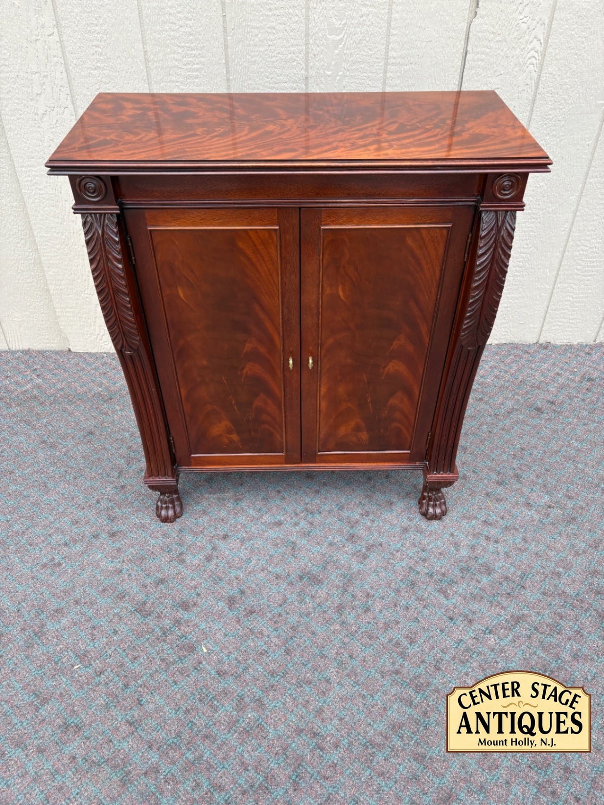 68003 Antique Mahogany Cabinet with Claw Feet and Carved Details