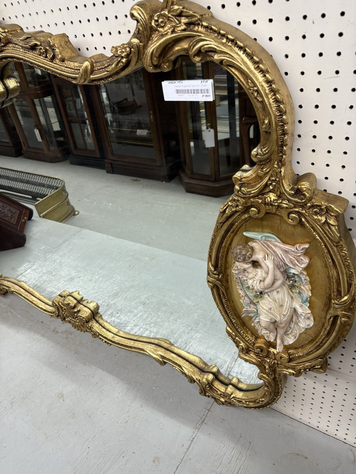 66917   Decorator Gold Mirror with Figural Plaques
