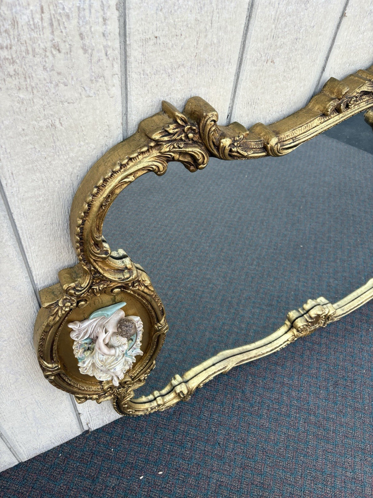 66917   Decorator Gold Mirror with Figural Plaques