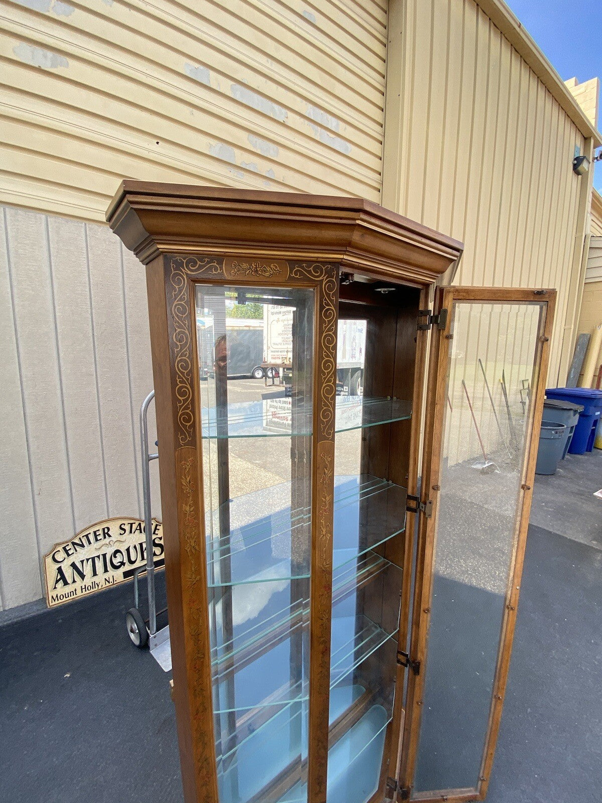 64593  Pulaski Stenciled Lighted Curio Cabinet With Plate Glass Shelves + Light