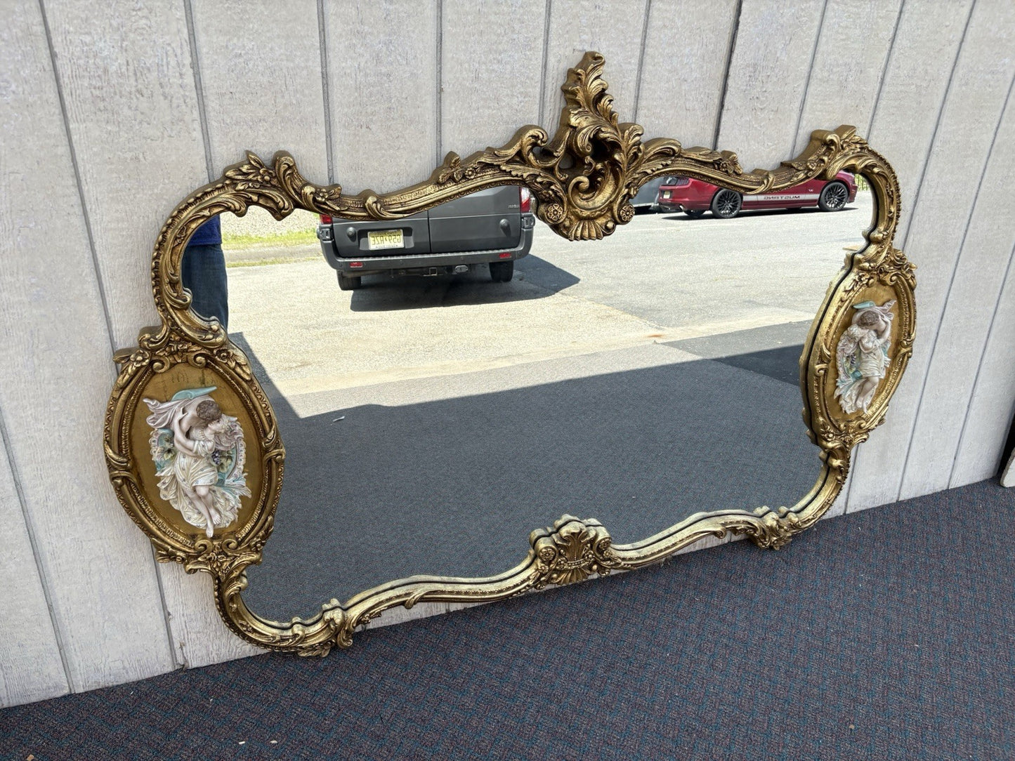 66917   Decorator Gold Mirror with Figural Plaques