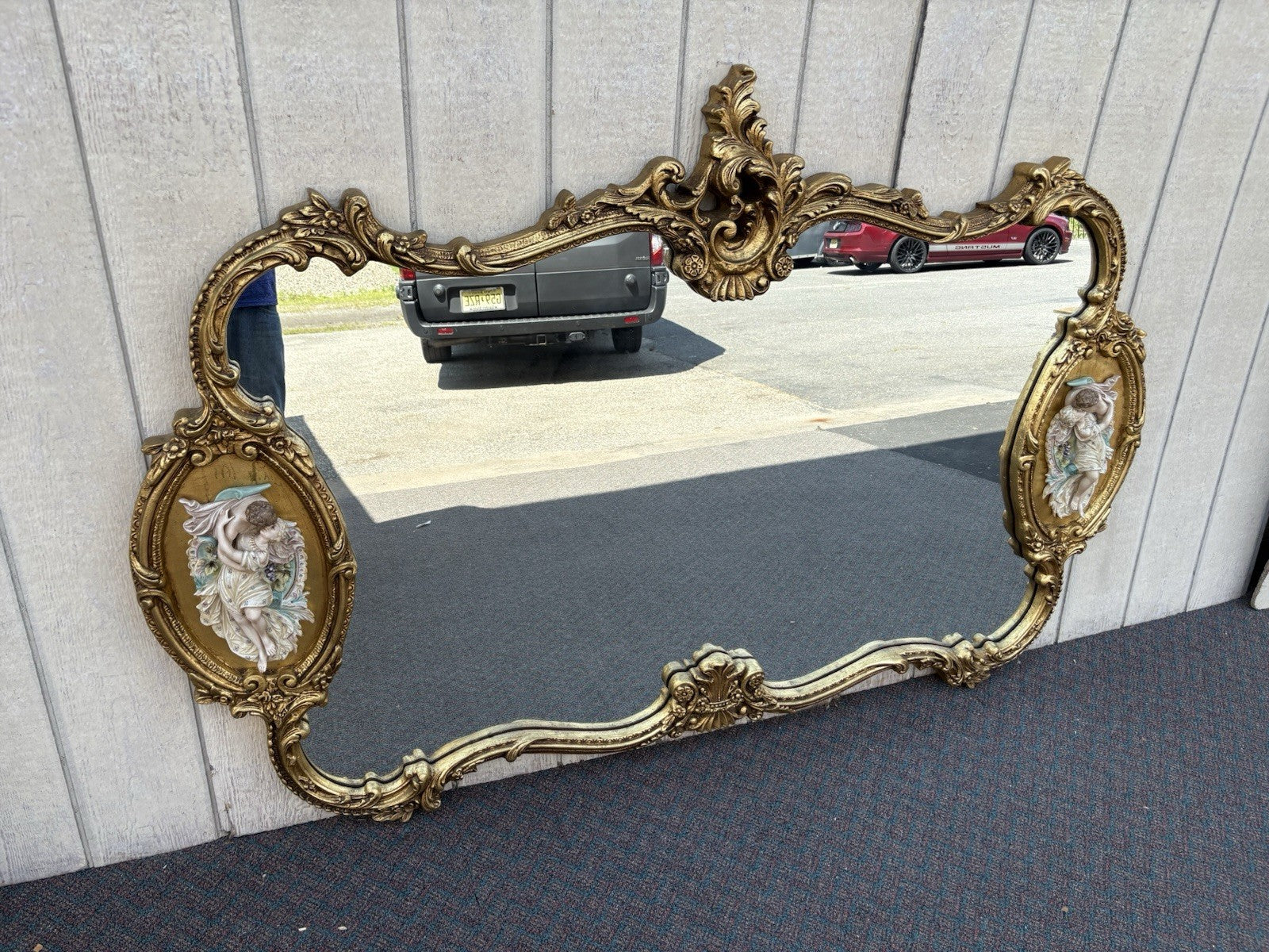 66917   Decorator Gold Mirror with Figural Plaques