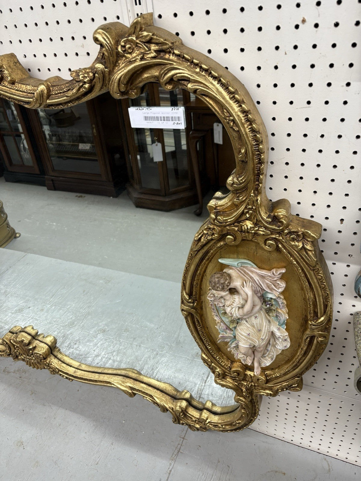 66917   Decorator Gold Mirror with Figural Plaques