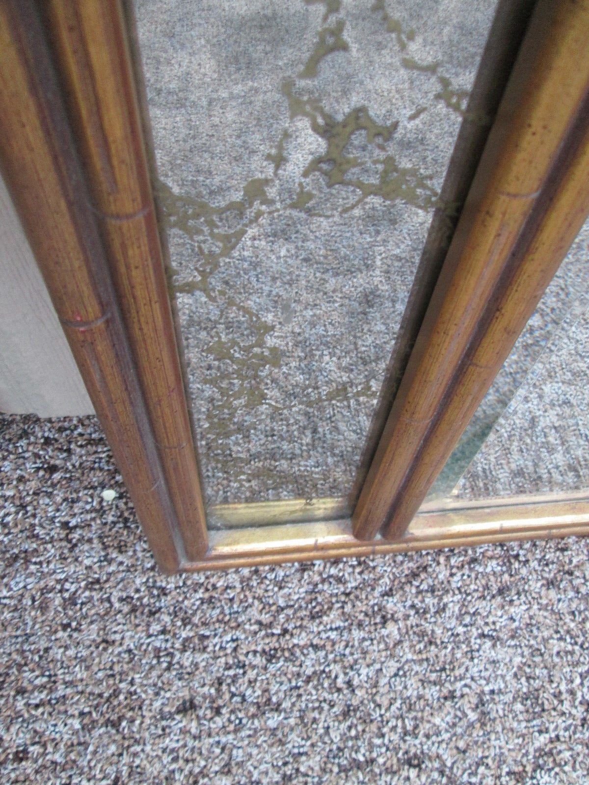 56014  Mid Century Modern Beveled Center Mirror Gold Intertwined mirrors