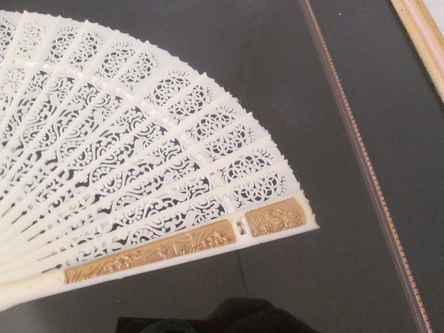 COL CW:    Decorative Celluloid Pierced Carved Fan in Frame