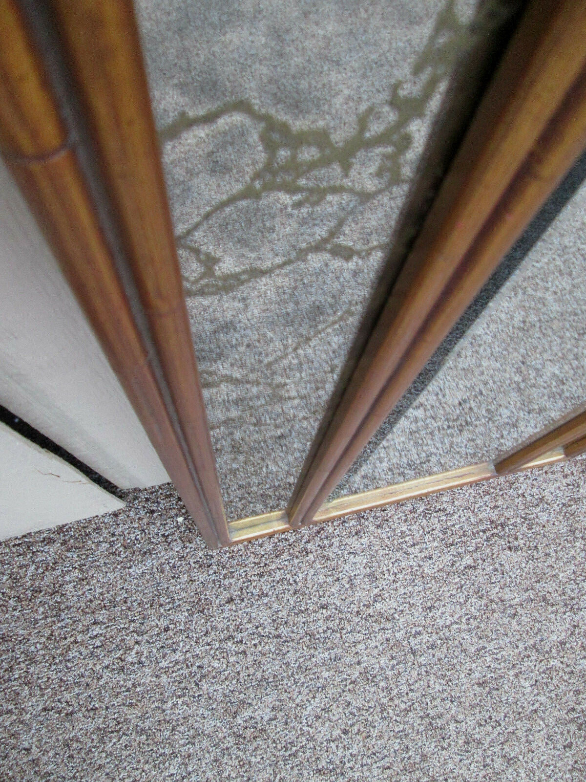 56014  Mid Century Modern Beveled Center Mirror Gold Intertwined mirrors