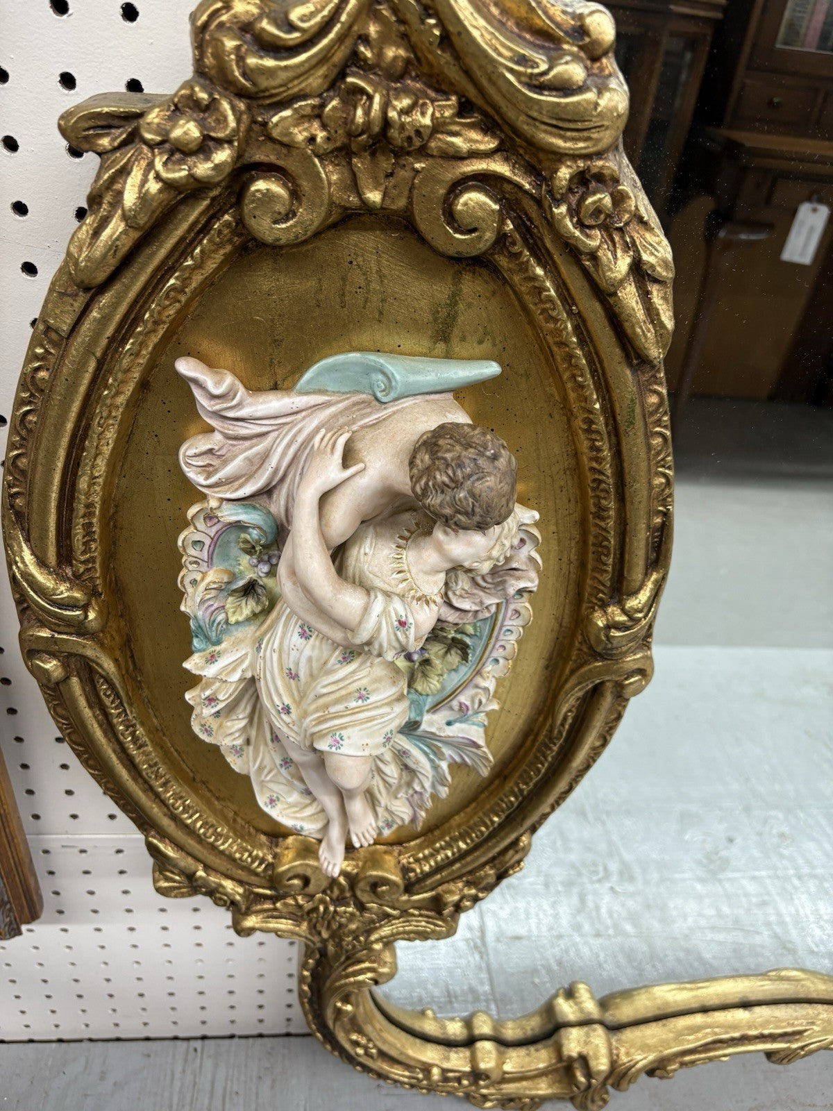 66917   Decorator Gold Mirror with Figural Plaques