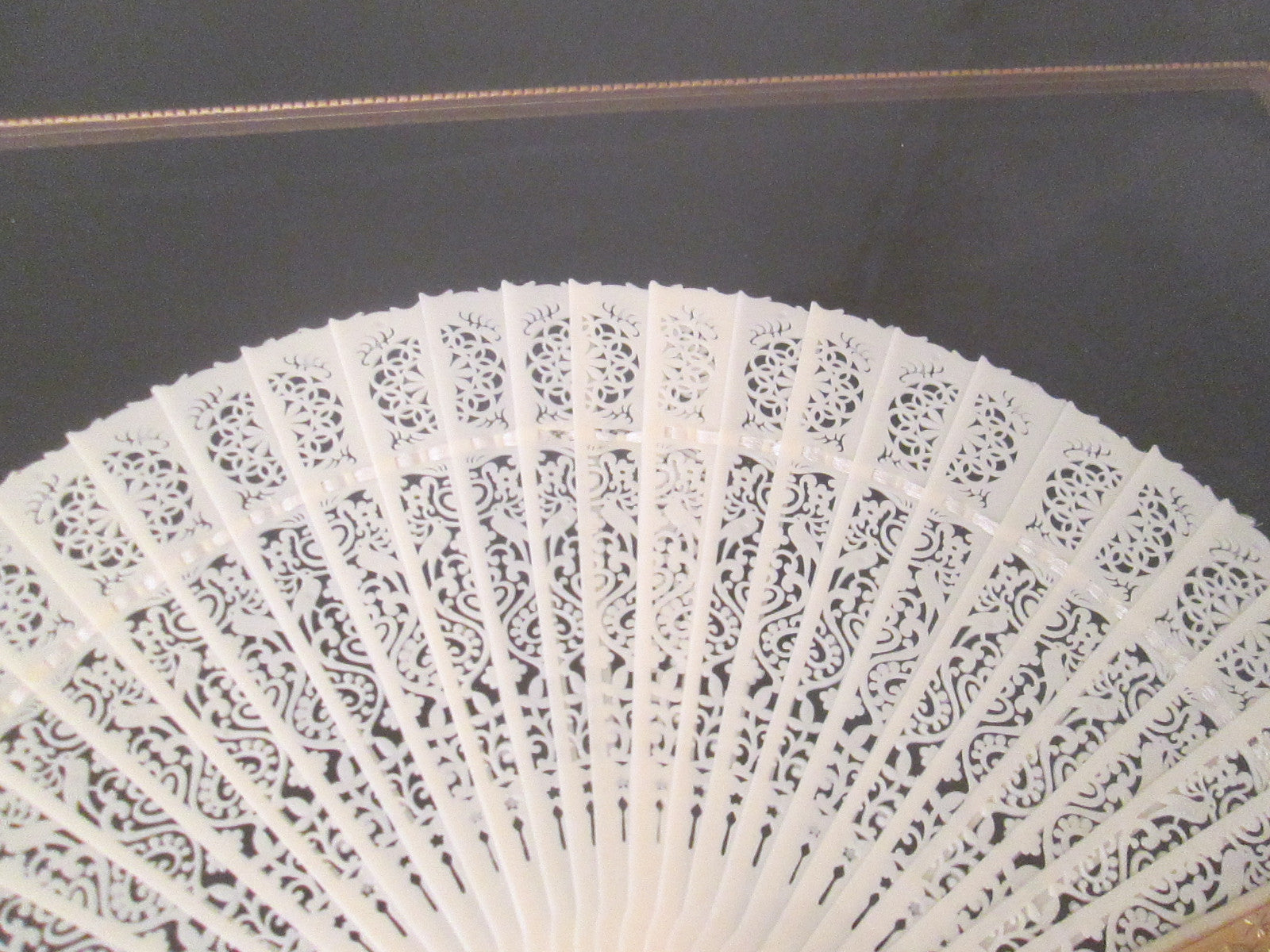 COL CW:    Decorative Celluloid Pierced Carved Fan in Frame