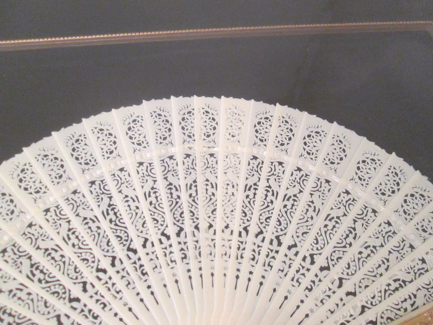 COL CW:    Decorative Celluloid Pierced Carved Fan in Frame