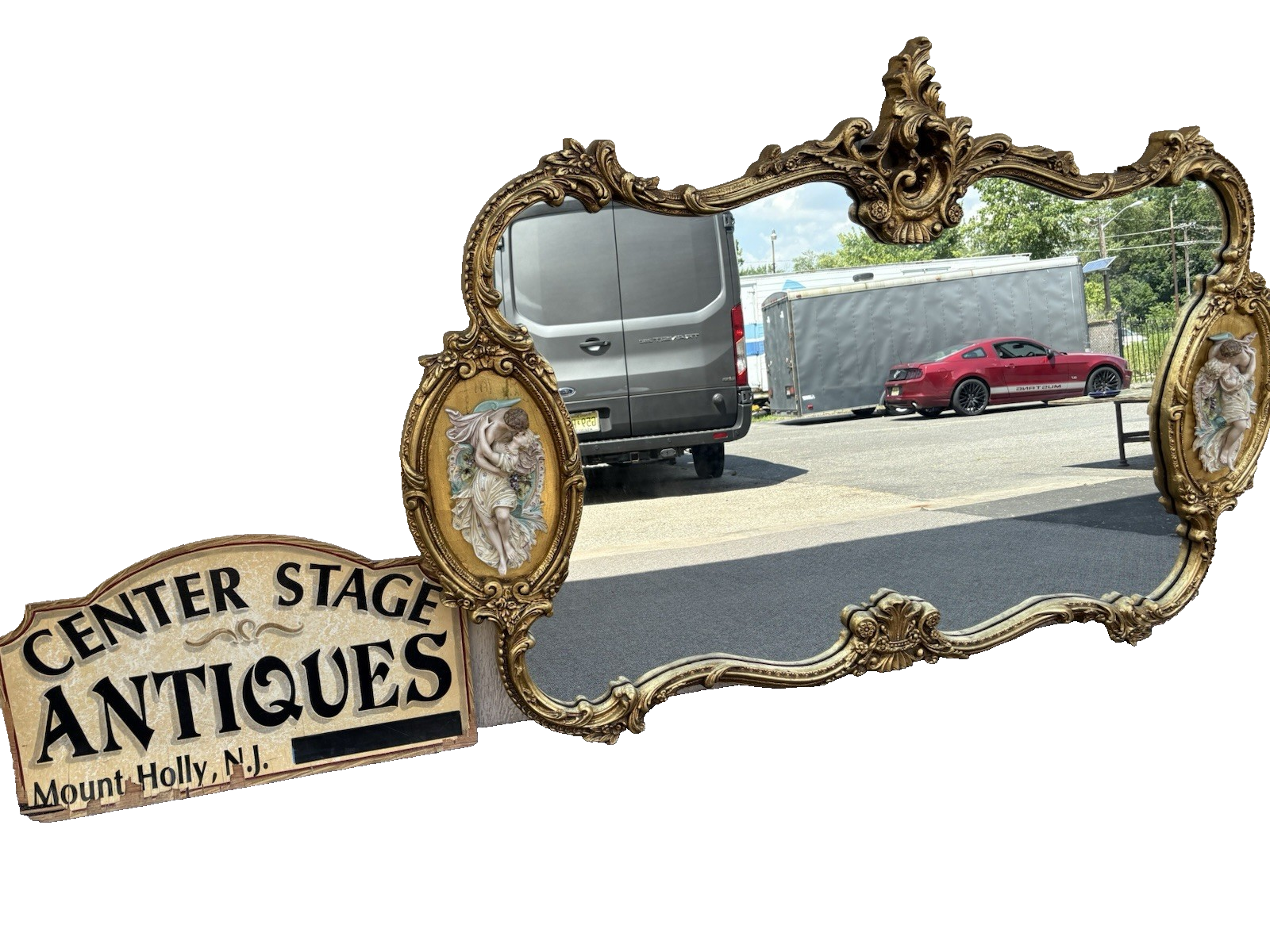 66917   Decorator Gold Mirror with Figural Plaques