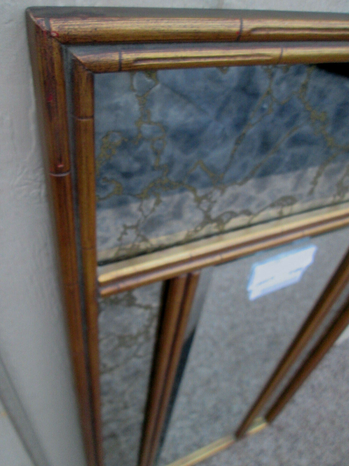 56014  Mid Century Modern Beveled Center Mirror Gold Intertwined mirrors