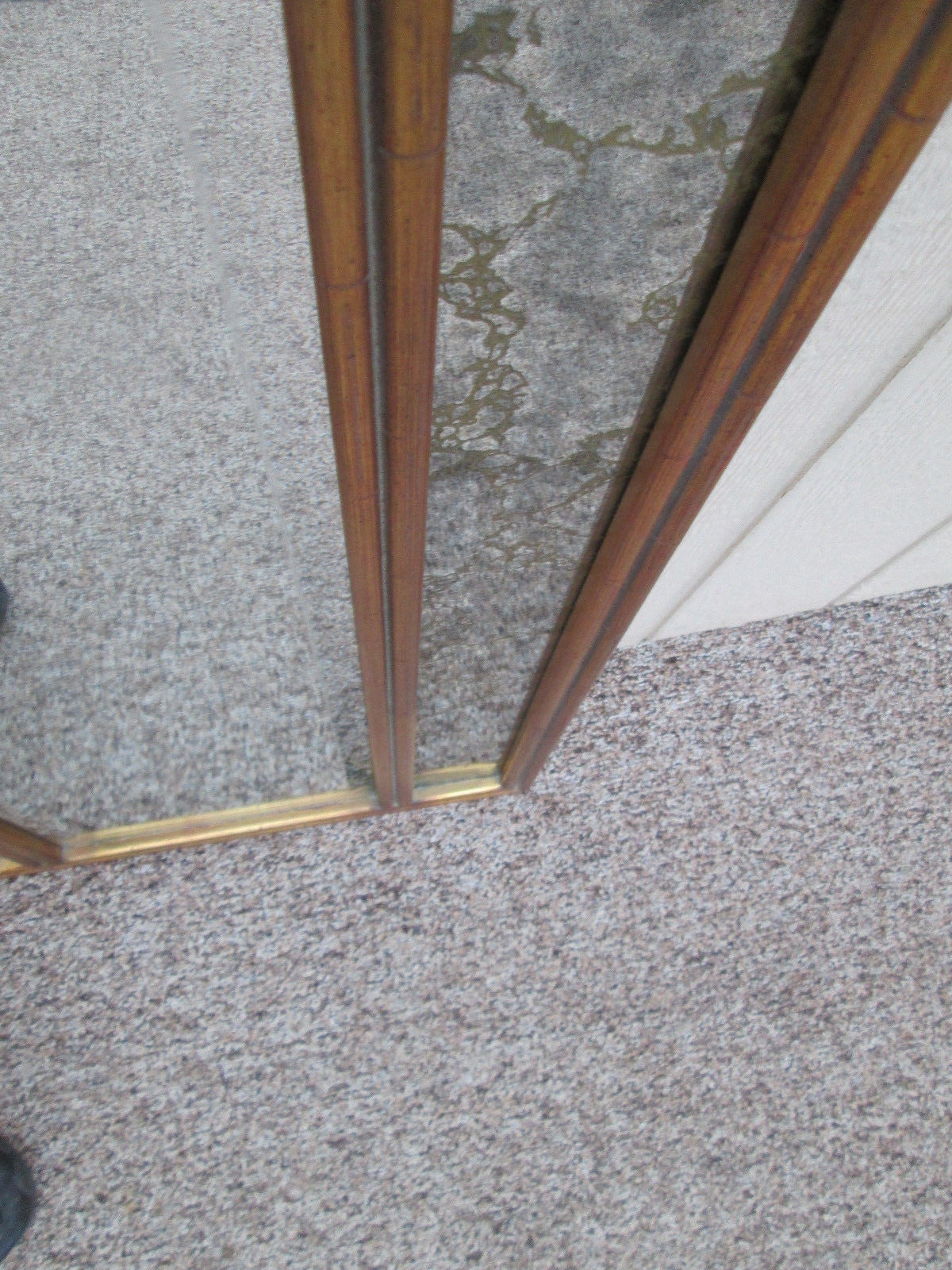 56014  Mid Century Modern Beveled Center Mirror Gold Intertwined mirrors