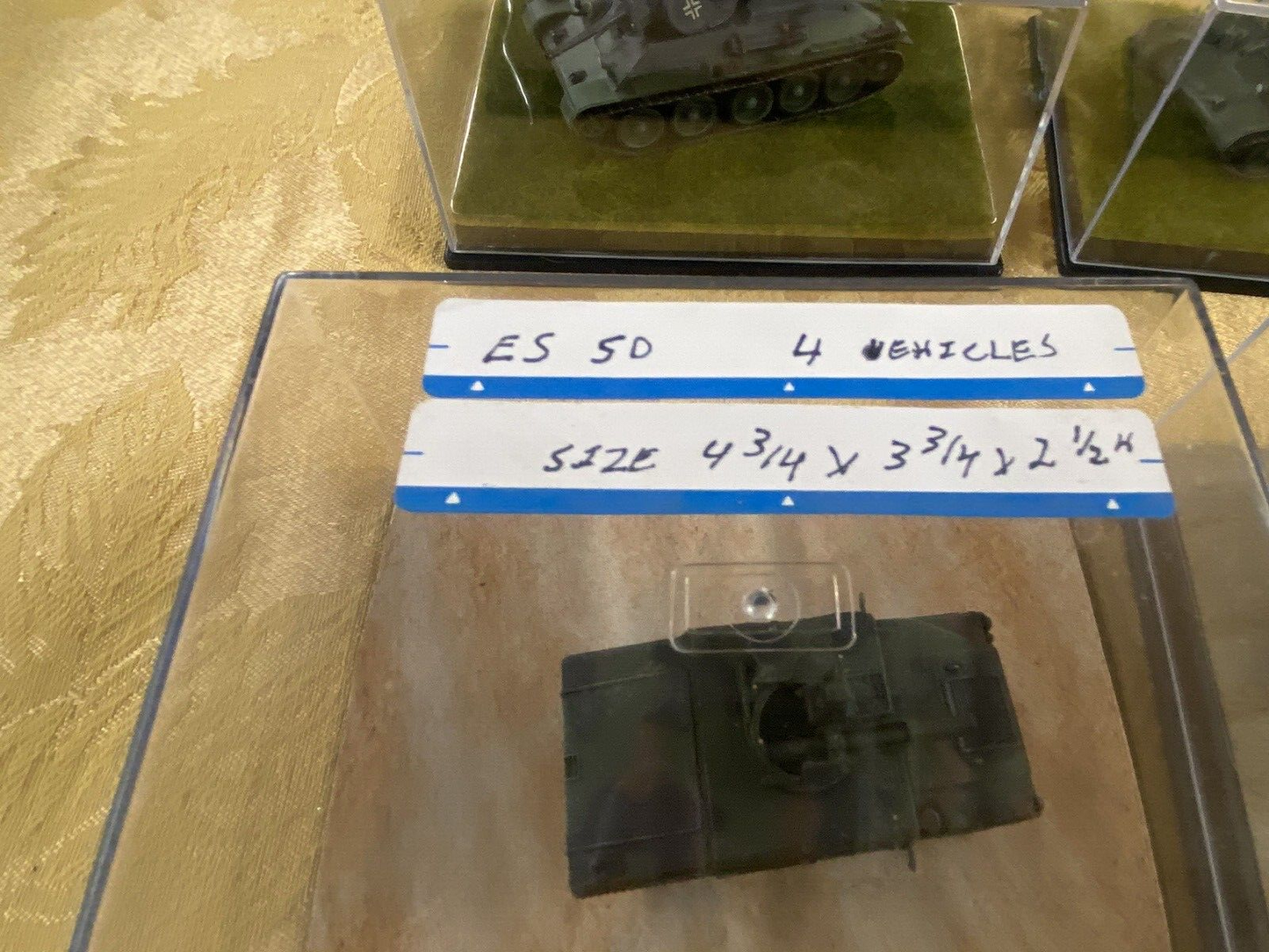 ES 50: Grouping of    4 Miltary  Tanks in Showcase    4 3/4" x 3 3/4" x 2 1/2"H