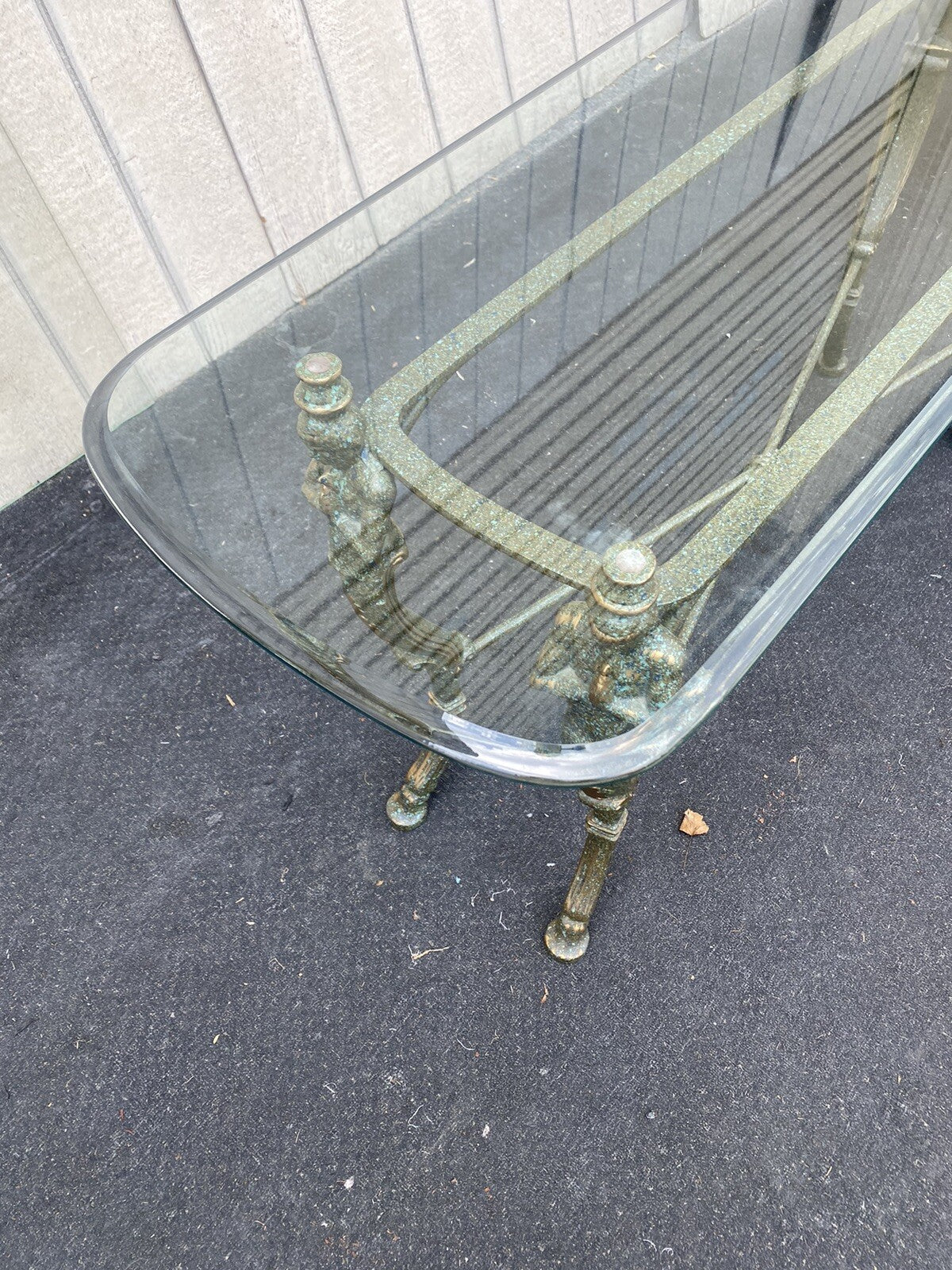 65667  Figural Glass Top Decorator Sofa Table