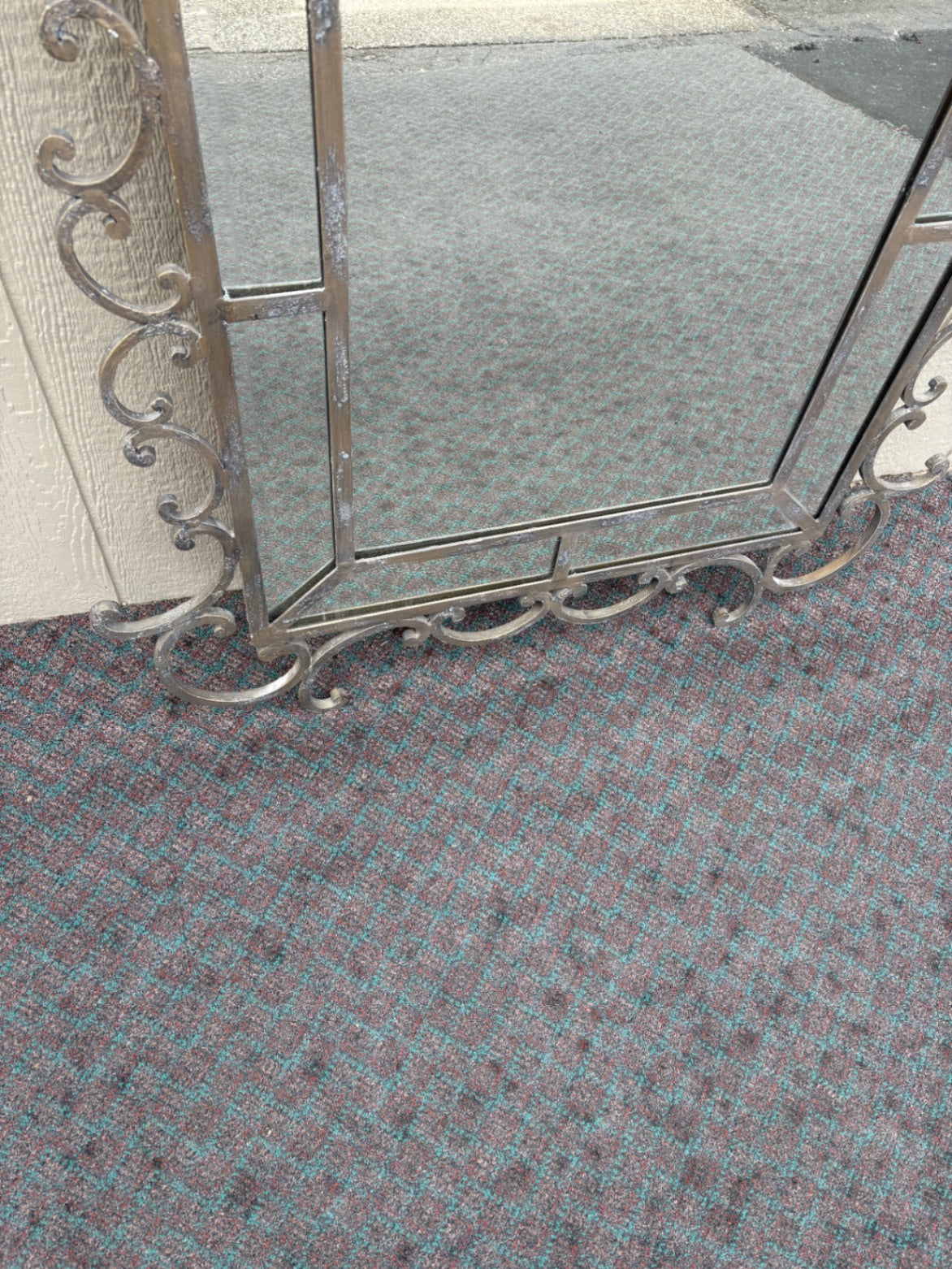 Ornate Wrought Iron Wall Mirror with Scrollwork Design