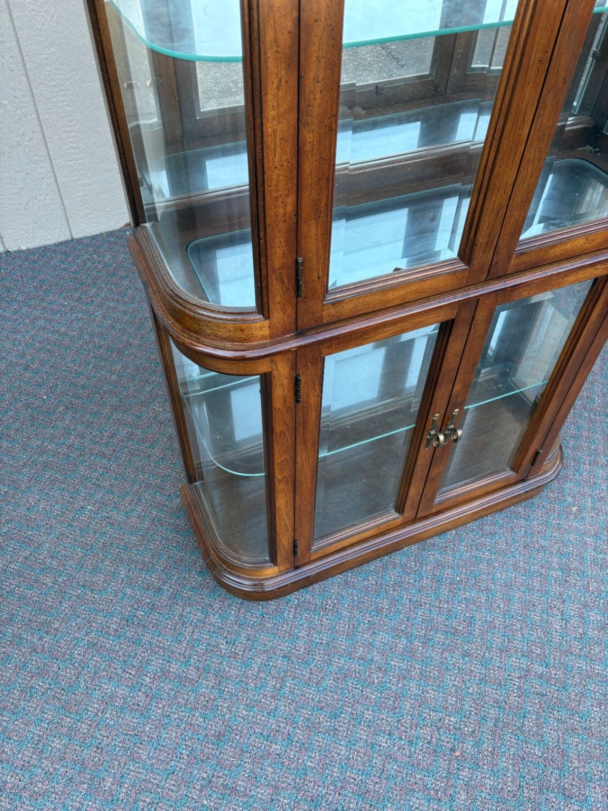 67589  Pulaski Lighted Curio Cabinet with Bowed Glass Doors