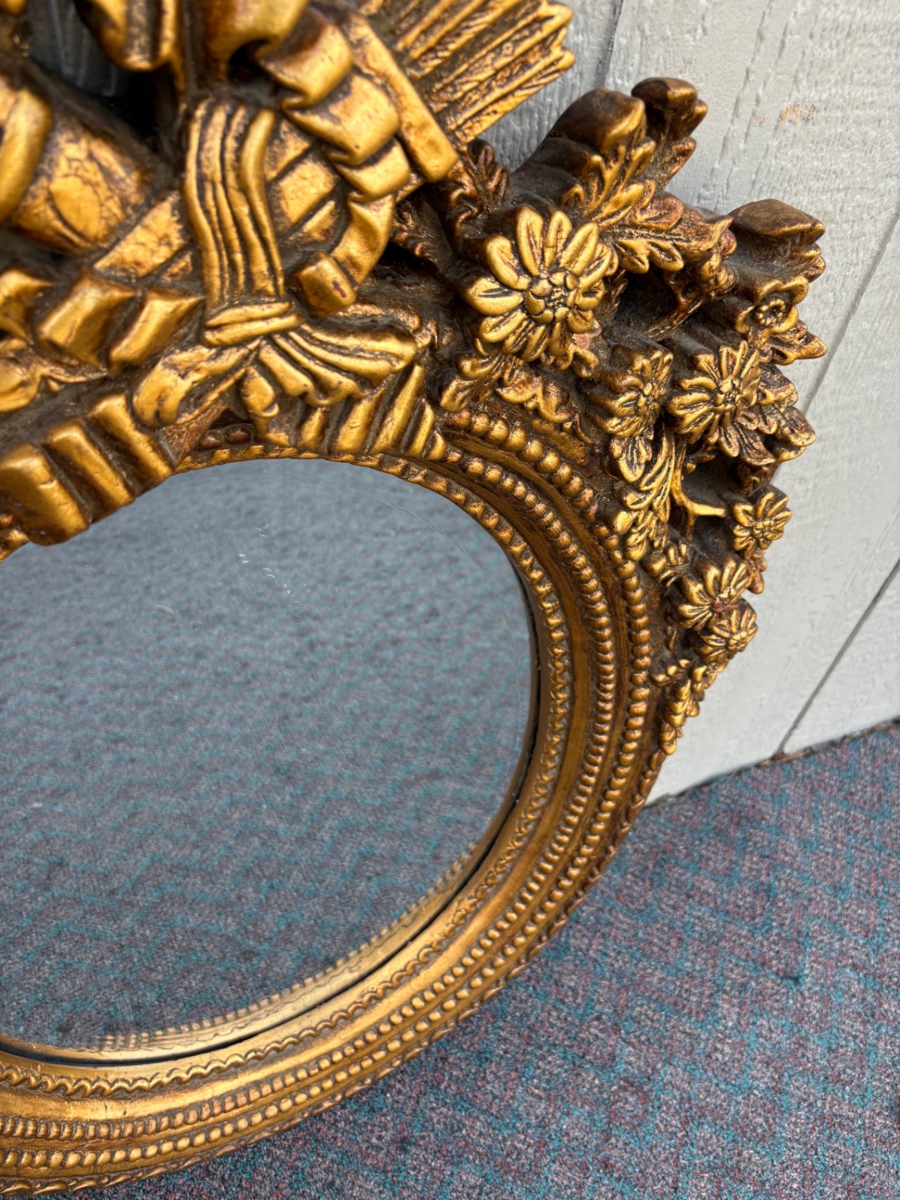 Ornate Gilt Gold Oval Mirror with Floral and Ribbon Details