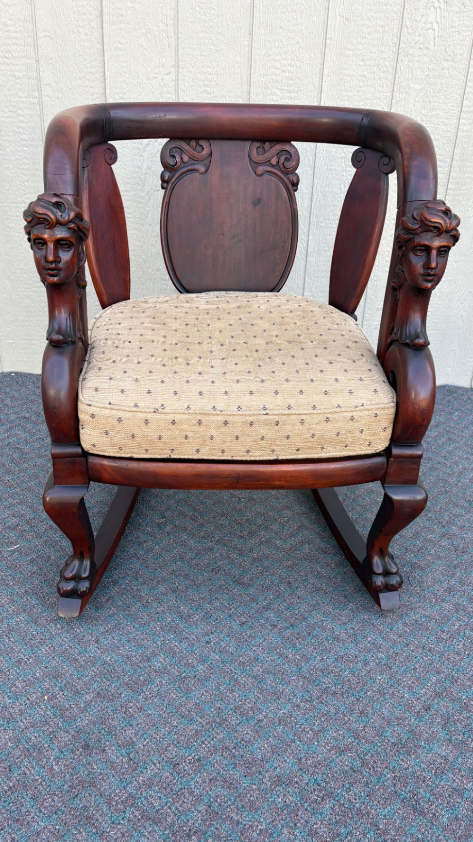 Victorian Mahogany Rocking Chair with Carved Bust Details