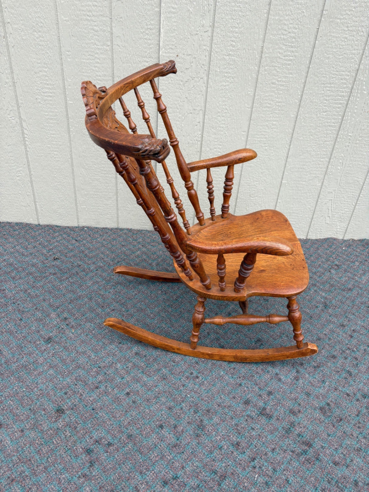 Antique Oak Lion's Head Carved Rocking Chair with Spindle Back
