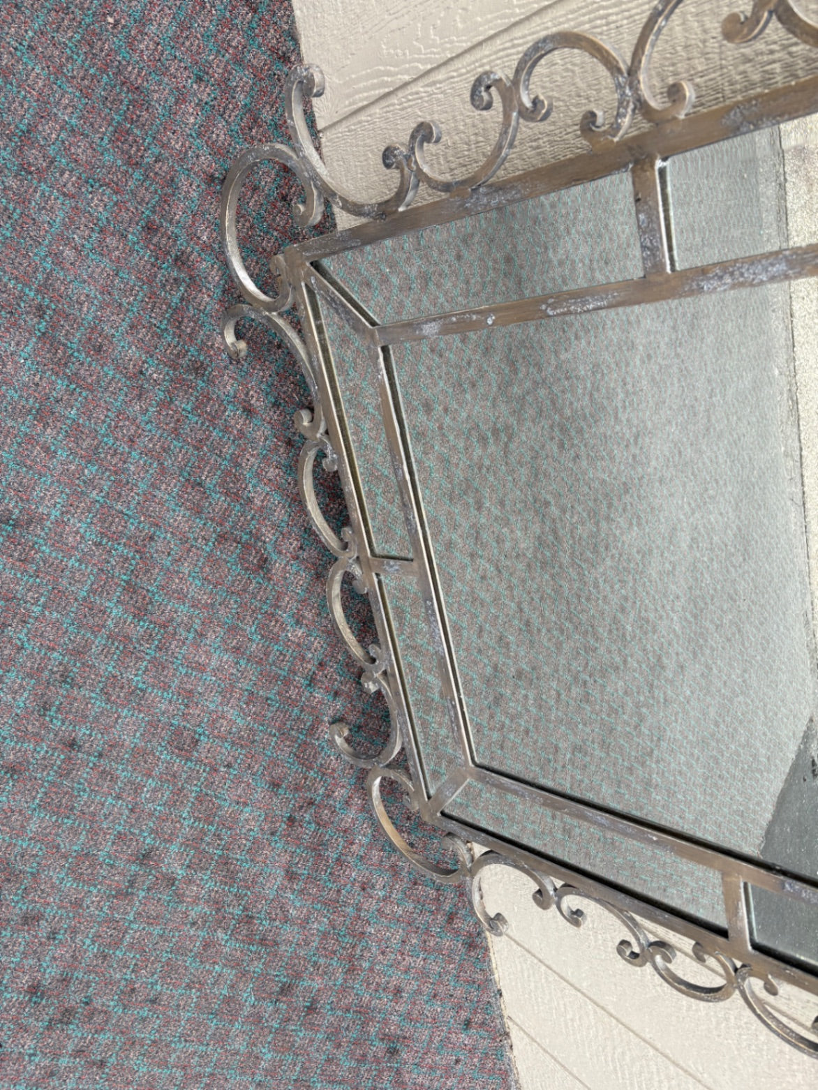 Ornate Wrought Iron Wall Mirror with Scrollwork Design