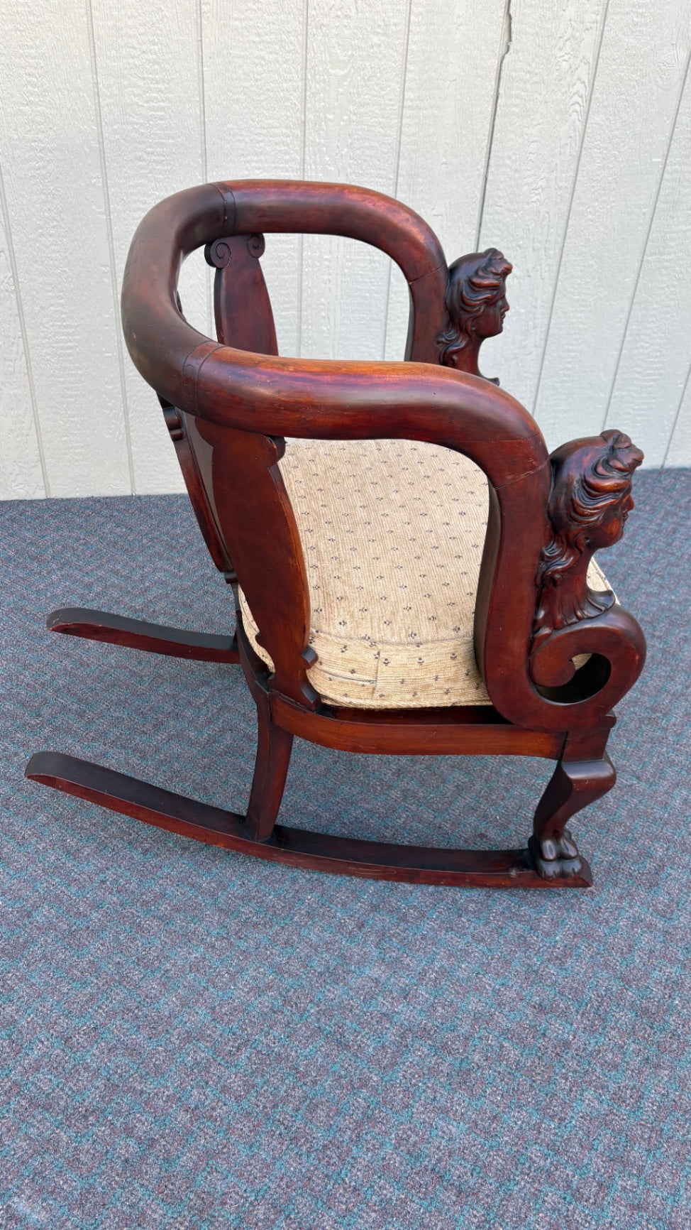 Victorian Mahogany Rocking Chair with Carved Bust Details