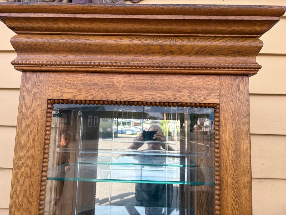 68202  Oak Curio Cabinet with Etched Glass and Crown Molding