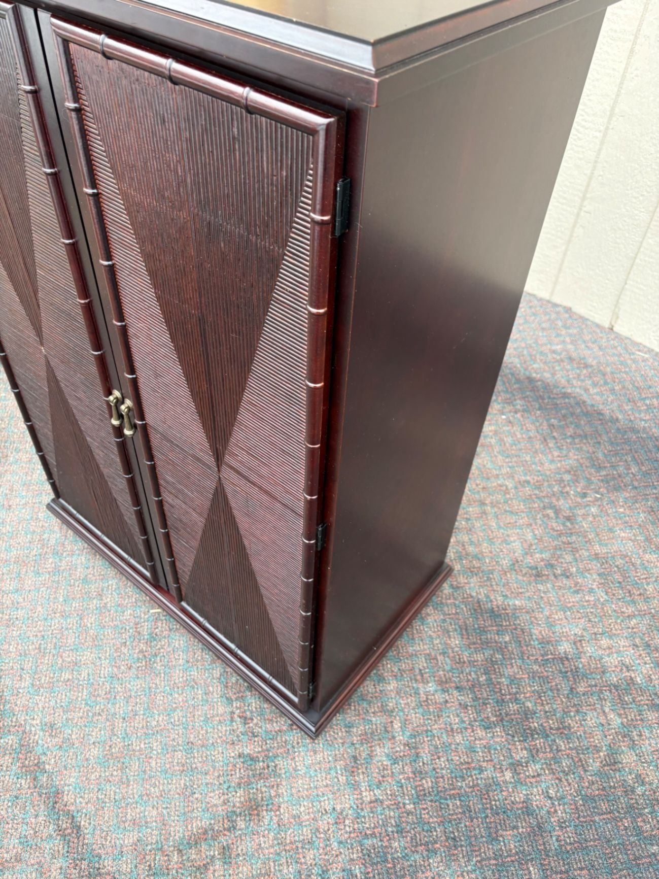 67458  Modern Asian-Inspired Storage Cabinet with Bamboo Detailing