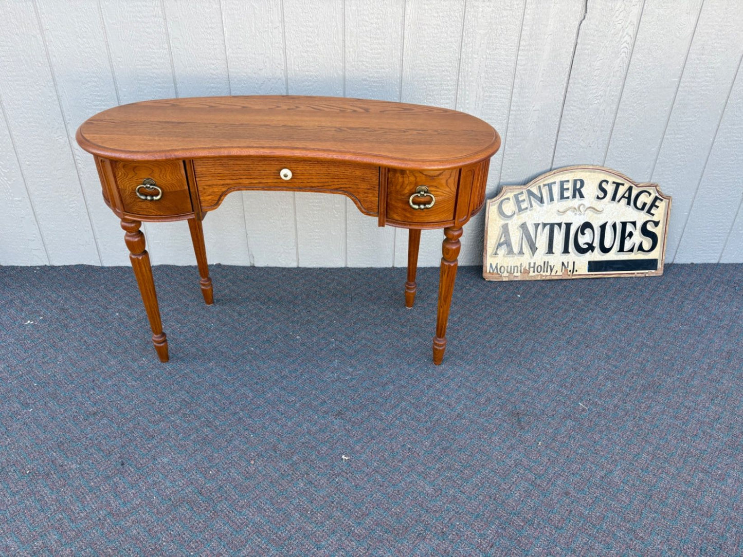 67435 Lexington Oak Kidney Desk with Brass Hardware