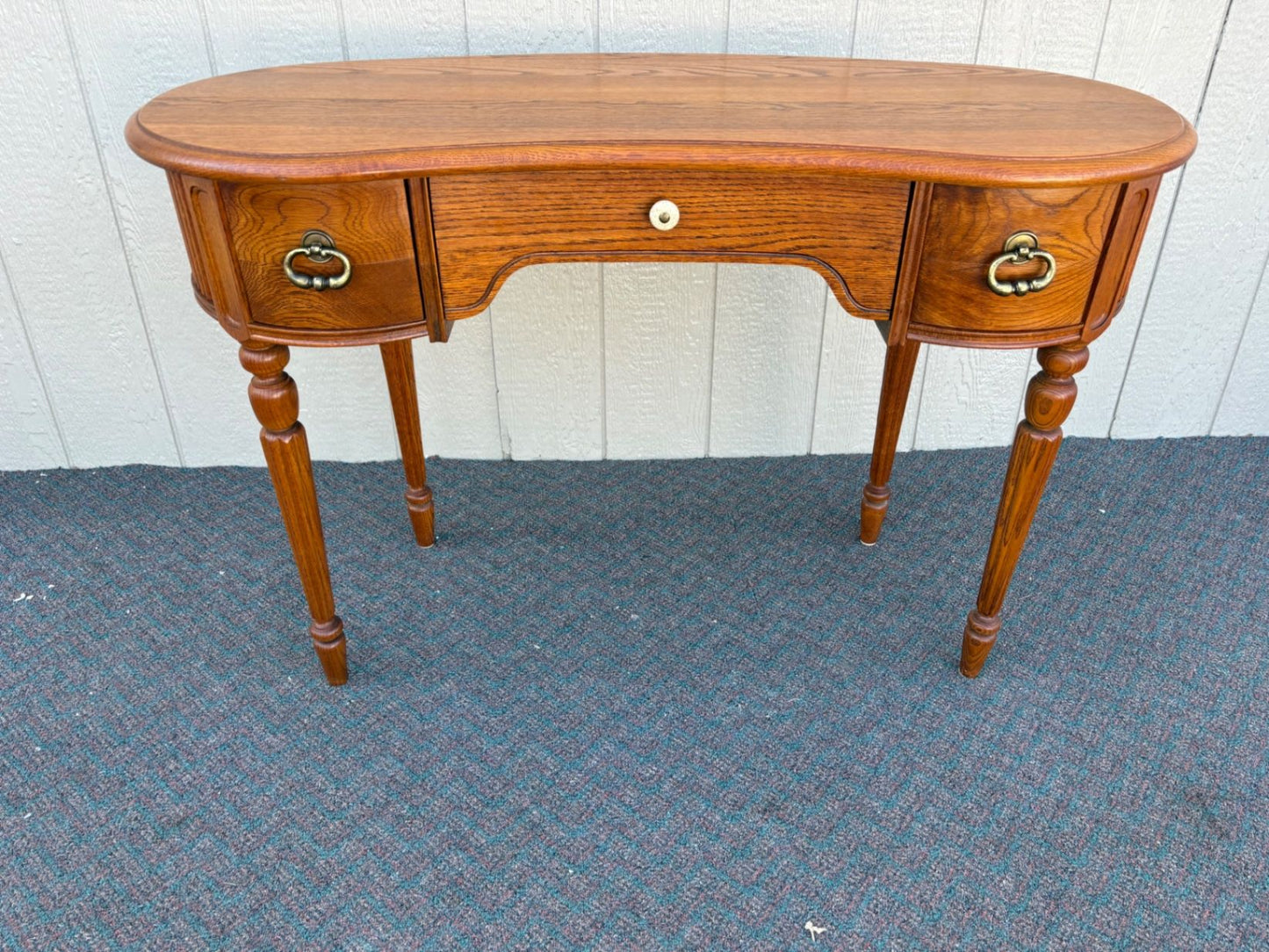 67435 Lexington Oak Kidney Desk with Brass Hardware